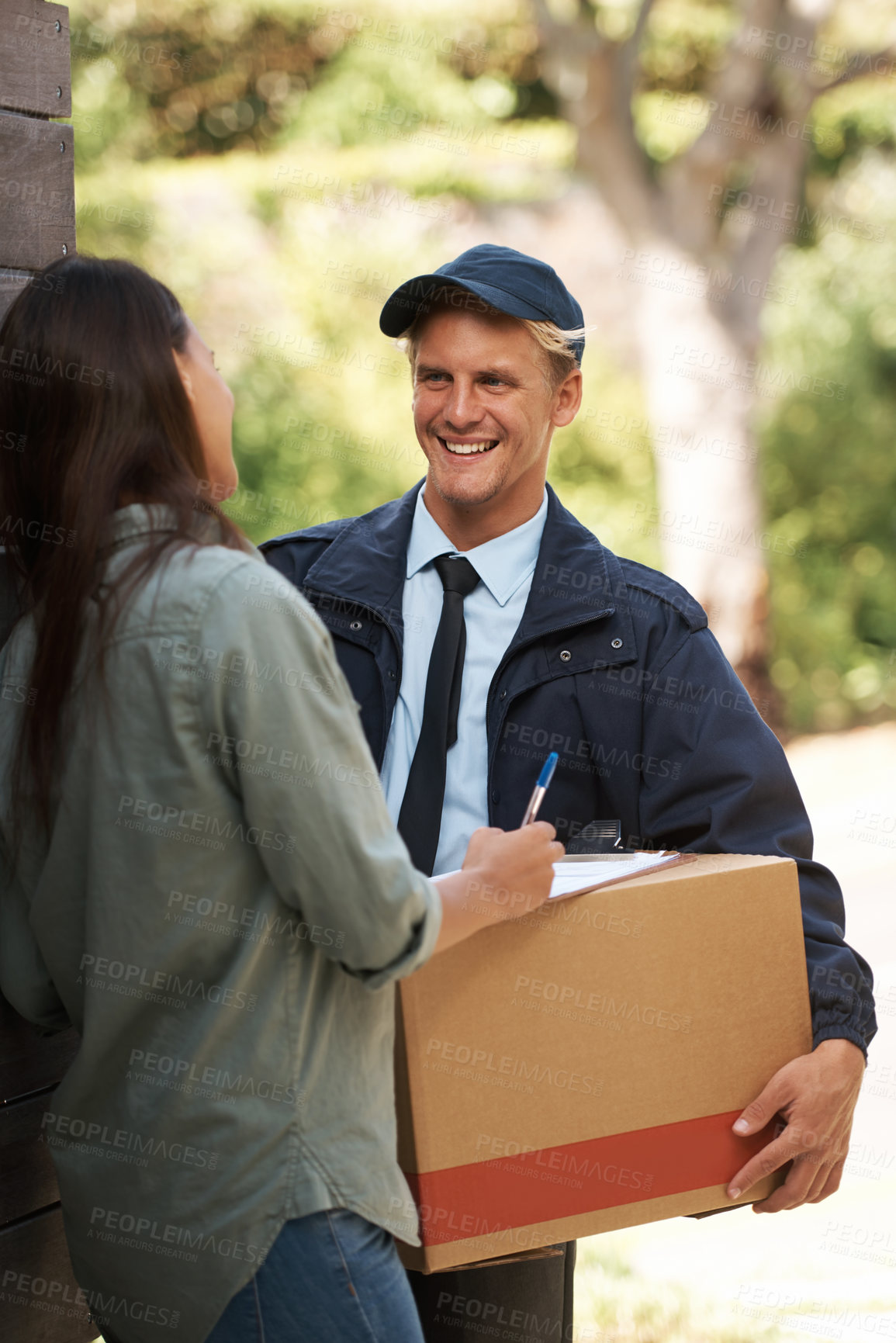 Buy stock photo Delivery, man and signature with package in box at home with clipboard at door for courier, happy and satisfied. People, shipment and woman with smile for parcel with order for house furniture