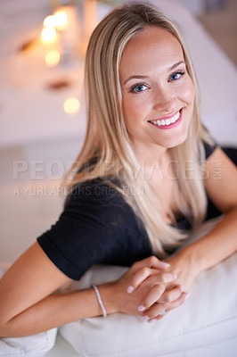Buy stock photo Woman, smile and portrait for relax and happy in home or indoor on weekend and alone on break and joyful. Young person and attractive for peace, rest or chill in living room or house on sofa or couch