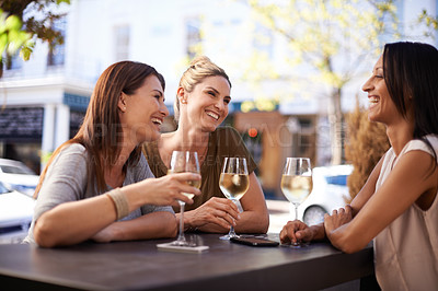 Buy stock photo Friends, wine and women drinking at restaurant with laughing, bonding and relax outdoor in city for celebration. People, happy and alcohol at cafe for social gathering, funny gossip or fun at reunion