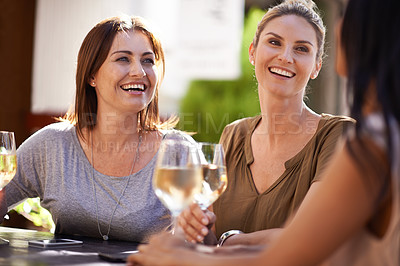 Buy stock photo Friends, wine and women drinking at cafe with laughing, bonding and relax outdoor in city for celebration. People, face and happy with alcohol at restaurant for social gathering, funny gossip or joke