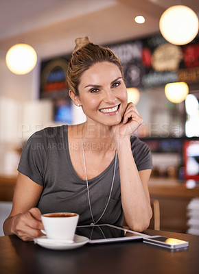 Buy stock photo Woman, relax and portrait in coffee shop with tablet and phone to review restaurant as customer in hospitality. Girl, smile and enjoy espresso latte and reading article or blog online with technology
