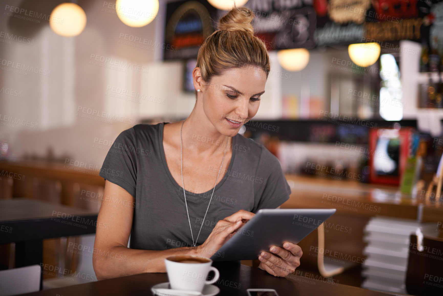 Buy stock photo Happy woman, tablet and research with coffee at cafe for communication, social media or networking. Female person or freelancer with smile for technology, online browsing or app at indoor restaurant