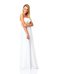 Lovely model in evening dress posing against white