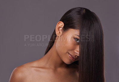 Buy stock photo Portrait, straight hair and beauty of woman in makeup for skincare isolated on a gray studio background. Hairstyle, face and Indian model in cosmetics at salon for treatment or care at hairdresser