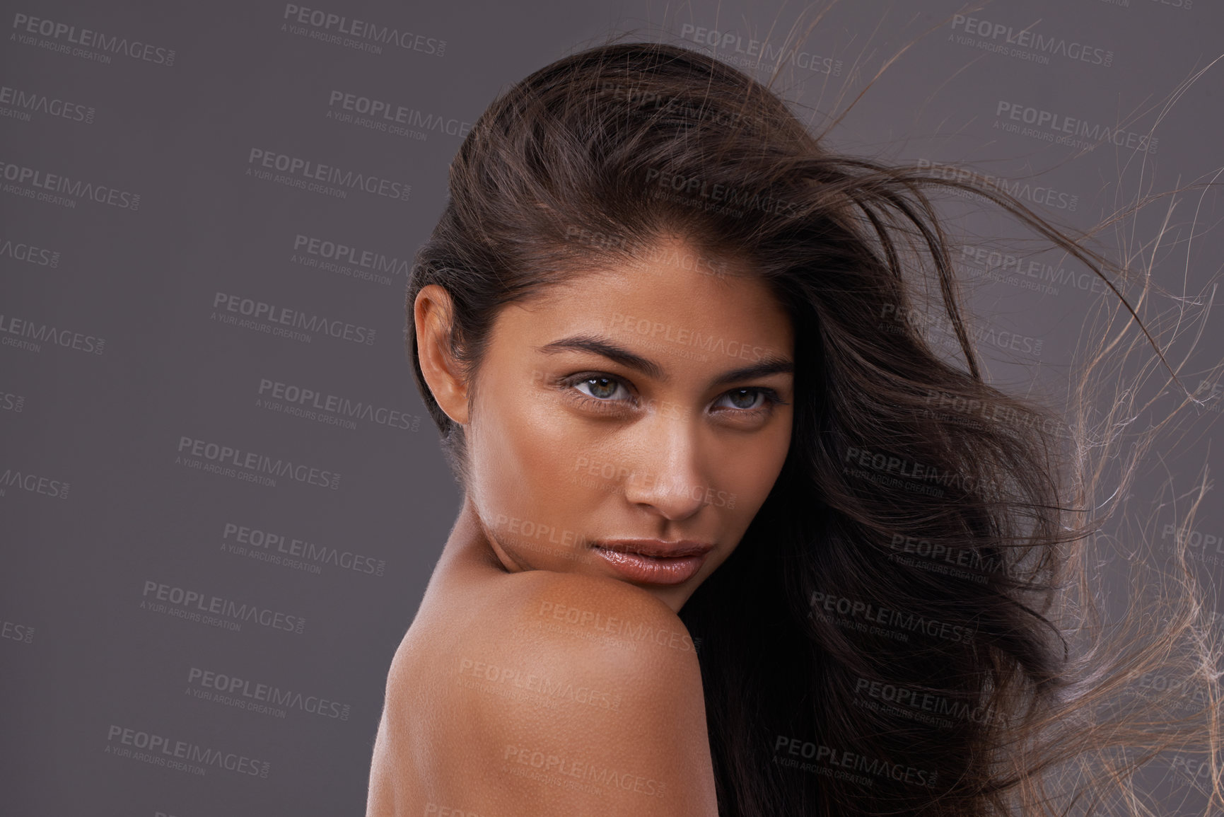 Buy stock photo Wind, blow dry and closeup of woman for hair care, treatment and beauty with mockup space isolated on studio background. Female person, model and hairstyle for shampoo, hairdressing and cosmetology