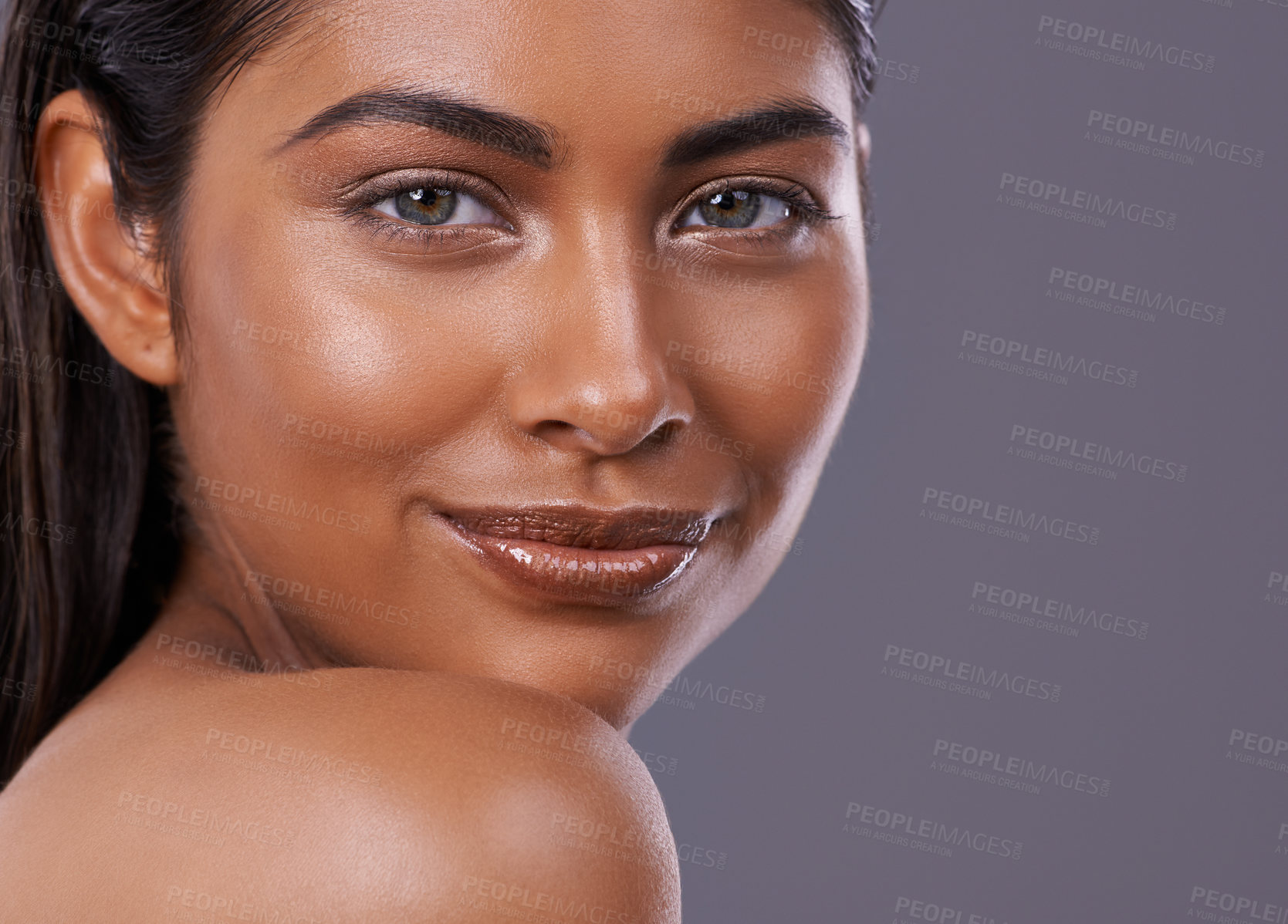 Buy stock photo Portrait, shine and woman with makeup, cosmetics and dermatology on grey studio background. Face, person and model with healthy skin and routine with skincare and grooming with glow and mockup space