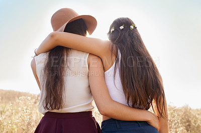Buy stock photo Friends, hug and walking on path in nature on holiday or journey on vacation in summer for adventure. Women, hiking or relax outdoor together on trail in woods, trekking on hill or travel environment
