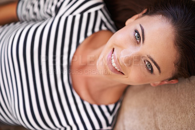 Buy stock photo Portrait of a beautiful young woman relaxing at home