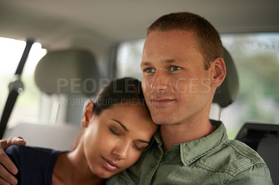 Buy stock photo Taxi, love and couple hug in a car with trust, support and safety, peace and bonding on commute. Travel, passenger and people embrace on a backseat of cab, transport or chauffeur service for journey