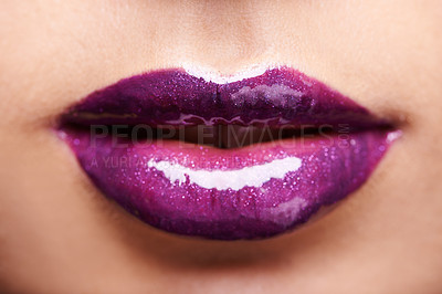 Buy stock photo Woman lips, purple lipstick and shine with makeup and beauty closeup, glossy cosmetics product and cosmetology. Glow, bold color aesthetic and cosmetic care, female model with violet lip gloss