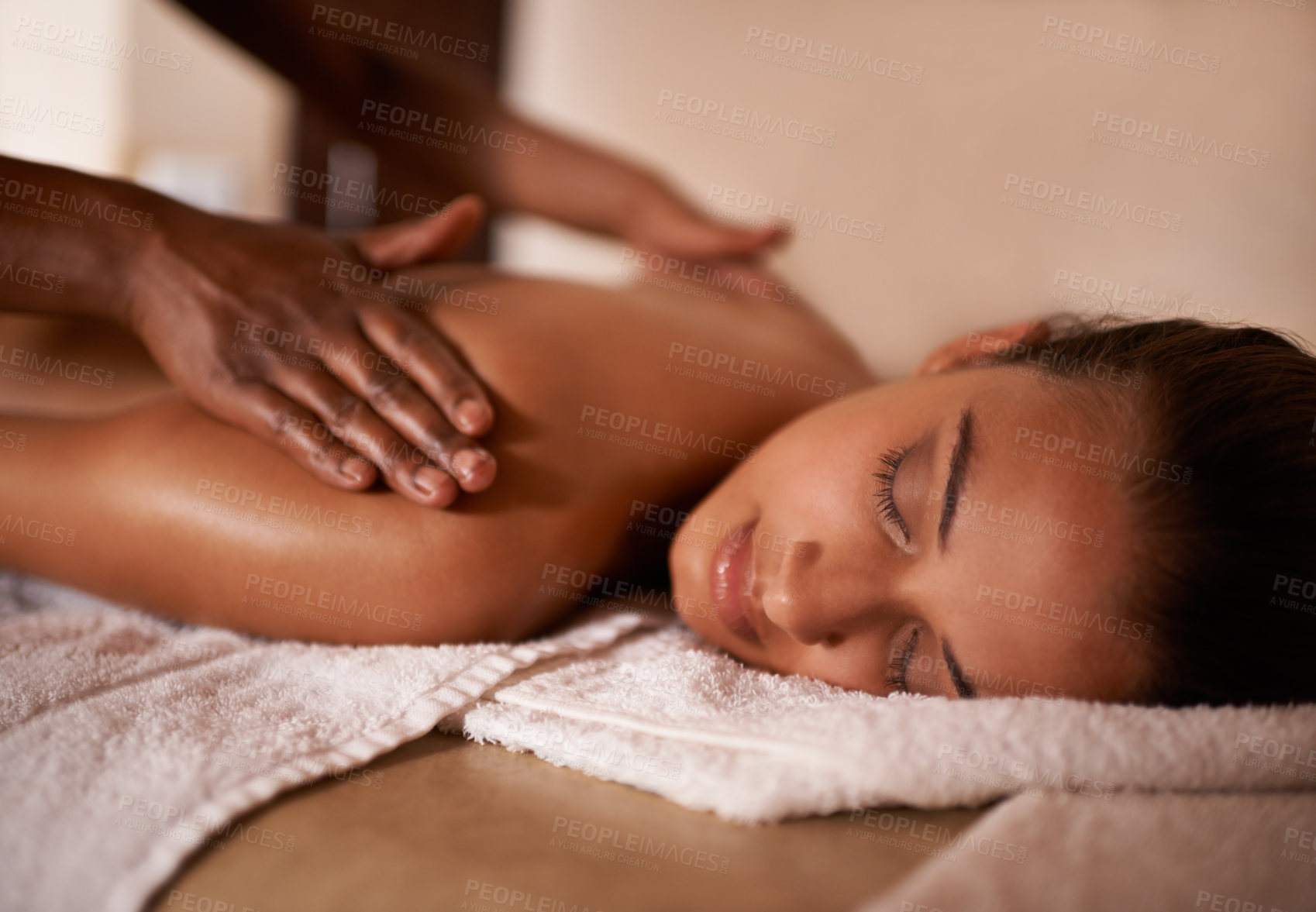 Buy stock photo Hands, woman and sleep at spa for massage, wellness and skin care for back, chiropractic therapy or peace. Female person, relax and health for lifestyle, body or wellbeing on table, calm or natural