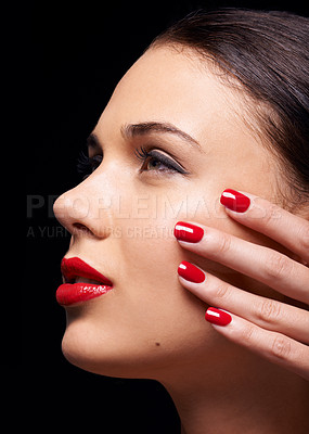 Buy stock photo Cosmetics, manicure and face of woman in studio with trendy, beauty and facial routine with red lips. Makeup, nail polish and female model with cosmetology treatment by dark black background.