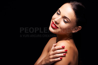 Buy stock photo A young woman with red lips and nails