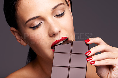 Buy stock photo Beauty, makeup and woman with chocolate bar in studio for cosmetics, manicure and skincare in gray background. Sweets, closeup and face of model for cocoa product unhealthy snack or eating candy