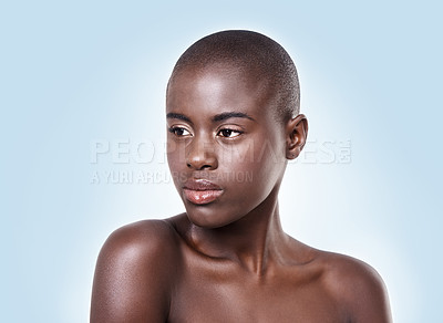 Buy stock photo Face of black woman, natural skincare or thinking of beauty cosmetics or healthy skin in studio. Dermatology, wellness ideas or African girl model with glow or skincare results on blue background