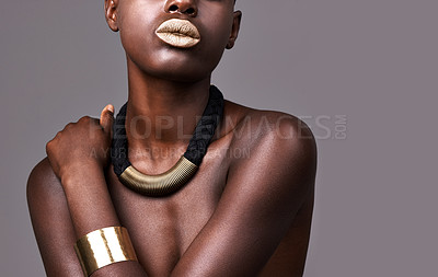Buy stock photo Cropped studio shot of a beautiful semi-dressed woman wearing jewelry