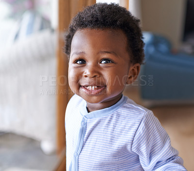 Buy stock photo Baby, smile or teeth in childcare, health or growth in play, leisure and relaxation in living room. Happy, black boy or child as curious, playful or fun in motor skill or childhood development