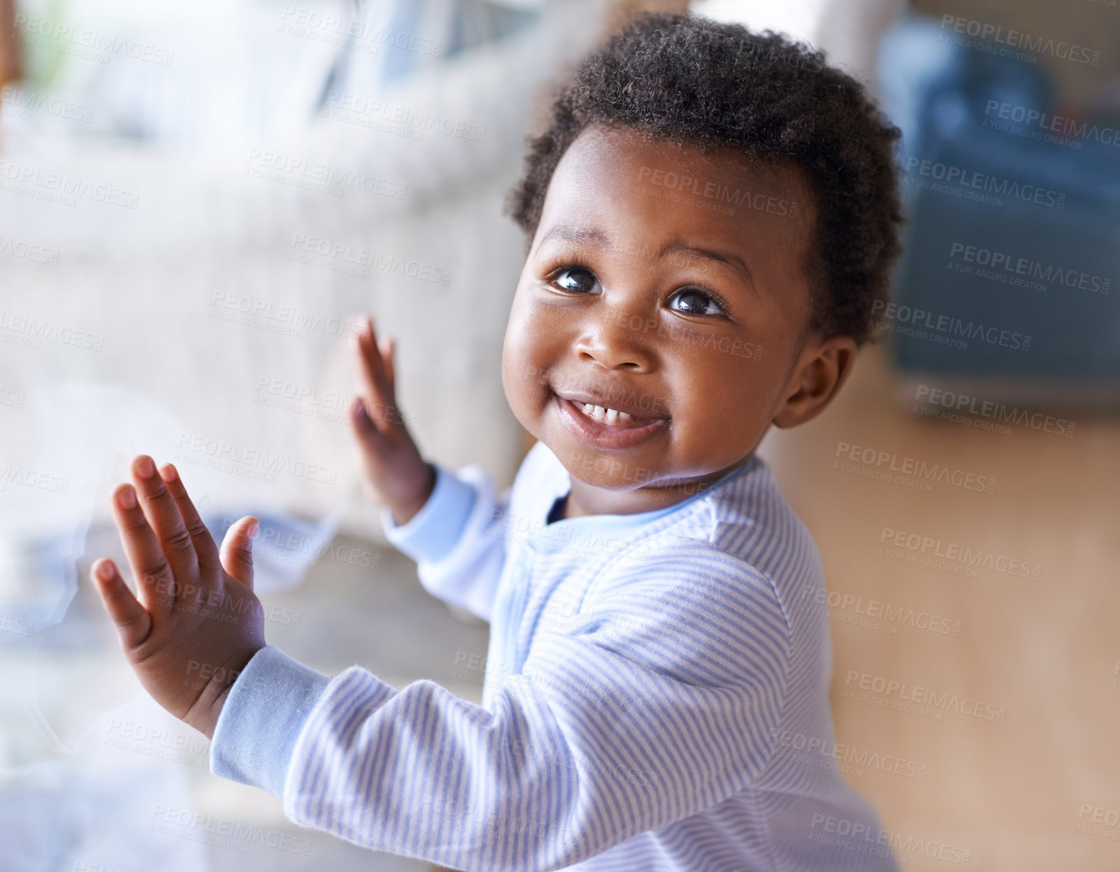 Buy stock photo Happy black baby boy, childhood development and child with smile standing against window at family home. Happiness with African male toddler, growth and young cute kid at house with childcare