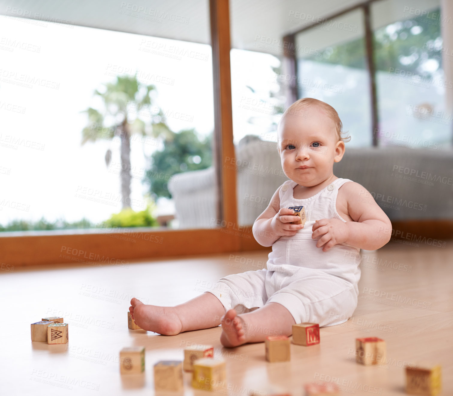Buy stock photo Portrait, baby and building blocks toy on a floor for fun, learning and playing in his home. Face, child and little boy with creative, alphabet and puzzle game in a living room, curious and sweet