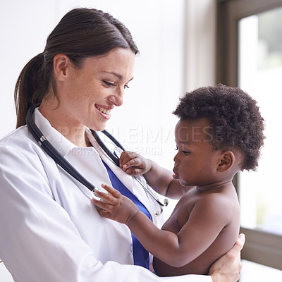 Buy stock photo Happy, pediatrician and woman with baby, boy and checkup with stethoscope and doctor in clinic. Medical, professional and employee with healthcare or infant with appointment or medicare with wellness