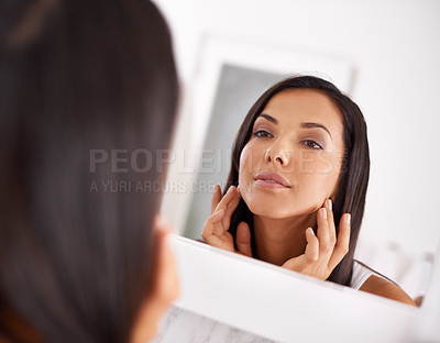 Buy stock photo Woman, makeup and skin care in bathroom mirror with beauty, dermatology or happy for face results. Young person with smile in reflection for facial foundation, cosmetics and getting ready at home 