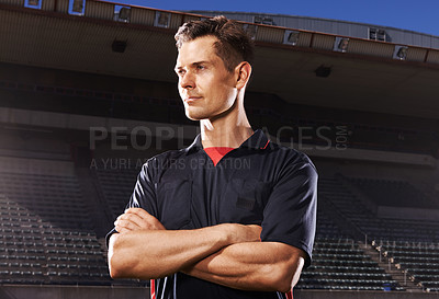 Buy stock photo Man, arms crossed and referee for sport at stadium, personal trainer or coach with determination and focus outdoor. Soccer umpire, challenge and competition at arena with confidence and pride at game