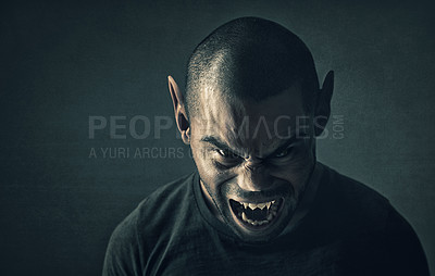 Buy stock photo Monster, man and face with horror in studio for fantasy, demon and angry vampire with fangs, scary and terror. Werewolf, devil and creepy creature with shouting, rage and surreal on black background