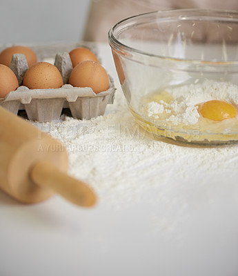 Buy stock photo Baking, kitchen and eggs in bowl with flour for cake, bread and pastry preparation in home. Culinary, bakery and closeup of ingredients, wheat and utensils for pizza, dough and food on counter