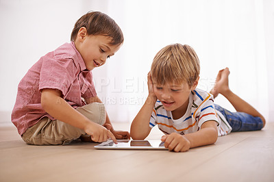 Buy stock photo Learning, tablet and happy children playing together in family home for fun and education. Boy kids or friends on floor to play or streaming internet for development with mobile app, game and video