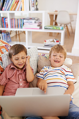 Buy stock photo Laptop, children and siblings on a sofa with cartoon, film or streaming movie at home. Computer, learning or boy kids in a house for google it, search or ebook storytelling, show or Netflix and chill