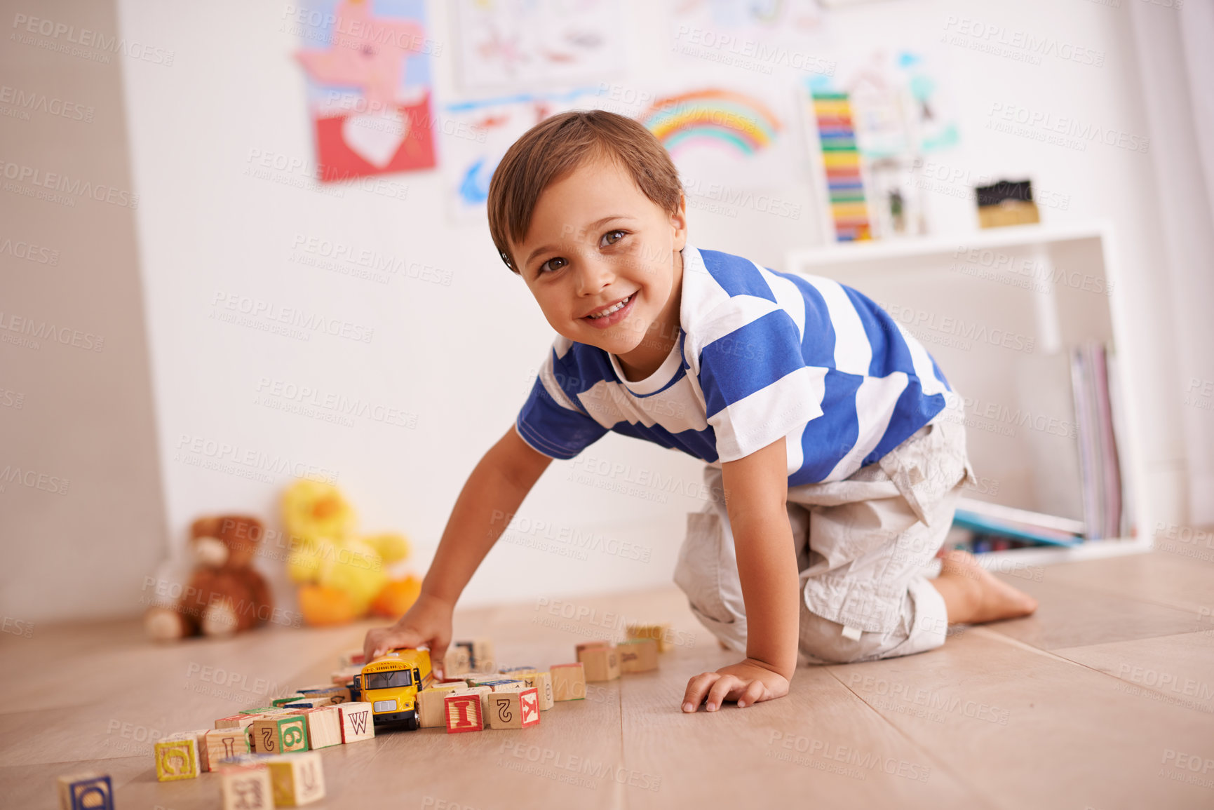 Buy stock photo Home, portrait or kid with building blocks for playing and learning for development or growth in playroom. Relax, playful or happiness with activity, young child toddler and fun games for creativity