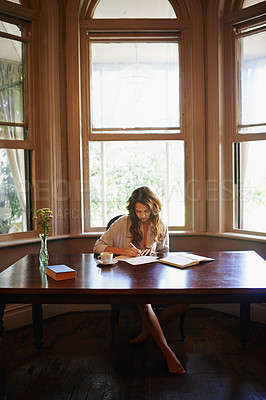 Buy stock photo Remote work, books and woman writing in home office for idea inspiration, checklist or planner. Freelance, creative and female writer with pen for novel notes, reminder or planning business startup