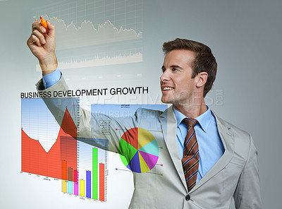 Buy stock photo Marketing, professional and employee with digital graphs for economy with futuristic interface. Businessman, smile and data engineer for corporate company, system and technology for accounting