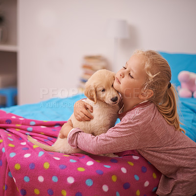 Buy stock photo Girl, child and puppy with hug on bed for playing, bonding and protection in bedroom of home with love. Kid, golden retriever and dog for companion, affection and embrace with pet care in apartment