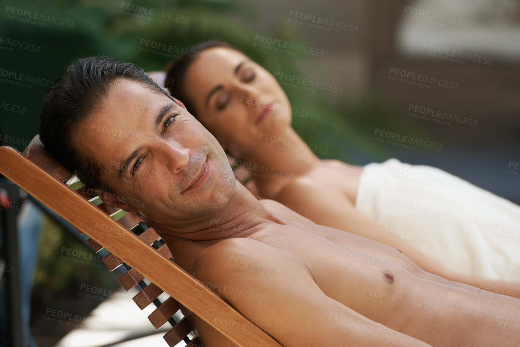 Buy stock photo Relax, sleeping and couple at spa on holiday, vacation and travel at resort, hotel and lodge in San Fransisco. Partners, lovers and people on break together for bonding, love and happiness outdoor