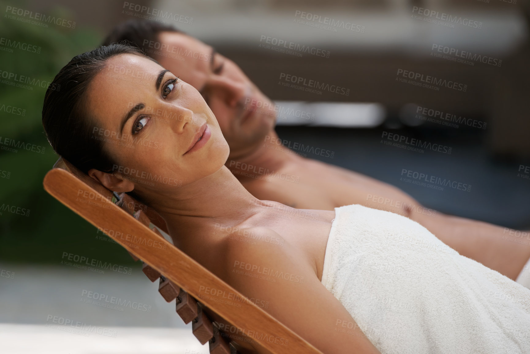 Buy stock photo Portrait, relax and couple at hotel pool with smile, sleep and holiday together at wellness spa getaway. Hospitality, happy woman and man at luxury villa for travel, vacation or love on romantic date