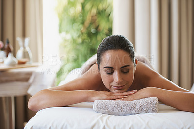Buy stock photo Spa, treatment and smile for woman on massage table, salon and beauty therapist in wellness centre. Peaceful, zen and physical therapy for body and relax, pamper and skin care for sleeping client 