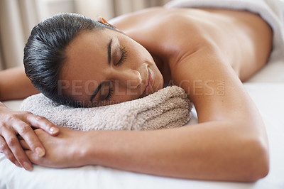 Buy stock photo Relax, massage and woman at spa for peace, calm and skincare at luxury resort with eyes closed for wellness. Beauty, therapy or person at salon for body treatment, health or rest on table for service
