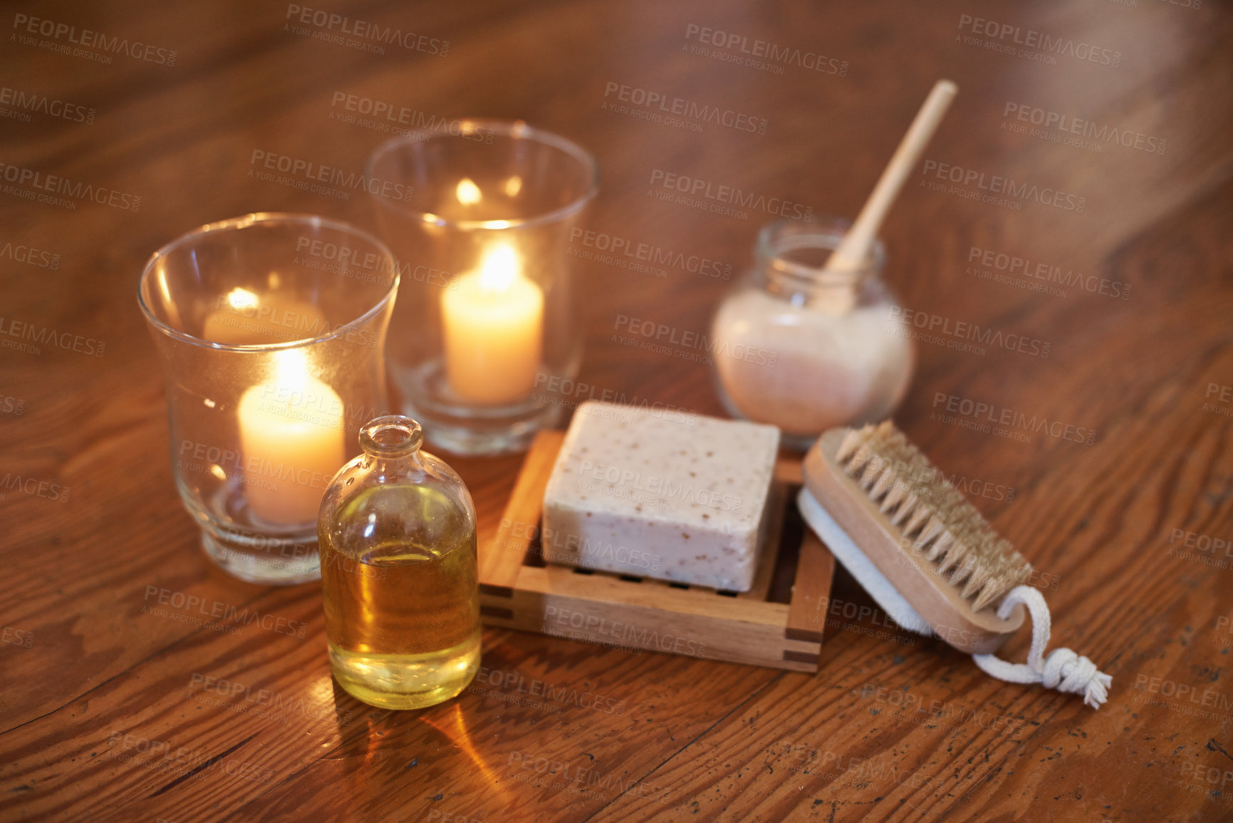Buy stock photo Spa, aromatherapy and candles with oil, brush for zen, calm or peace to relax for health or natural healing. Incense, wellness or flame light for wellbeing, holistic massage or hospitality background