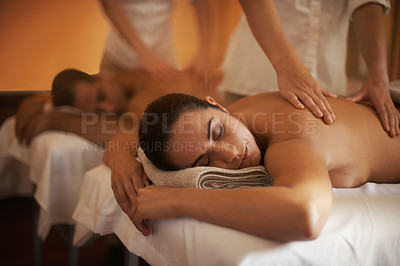 Buy stock photo Shot of a mature couple enjoying a relaxing massage