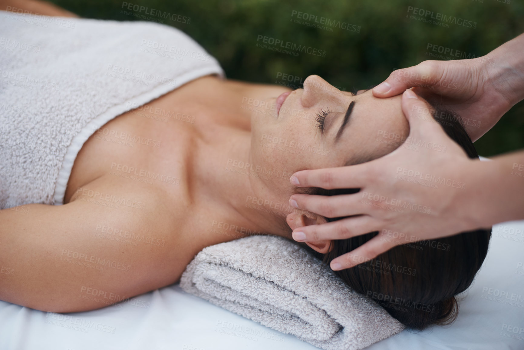 Buy stock photo Spa, woman and hands with massage for wellness at resort, luxury hotel and vacation for relax and therapeutic pamper. People, masseuse and body care with facial treatment, hospitality and zen outdoor