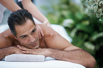 Buy stock photo Spa, man and back with massage for relax at resort, luxury hotel and vacation for wellness and therapeutic pamper. People, masseuse and body care with shoulder treatment, hospitality and zen outdoor