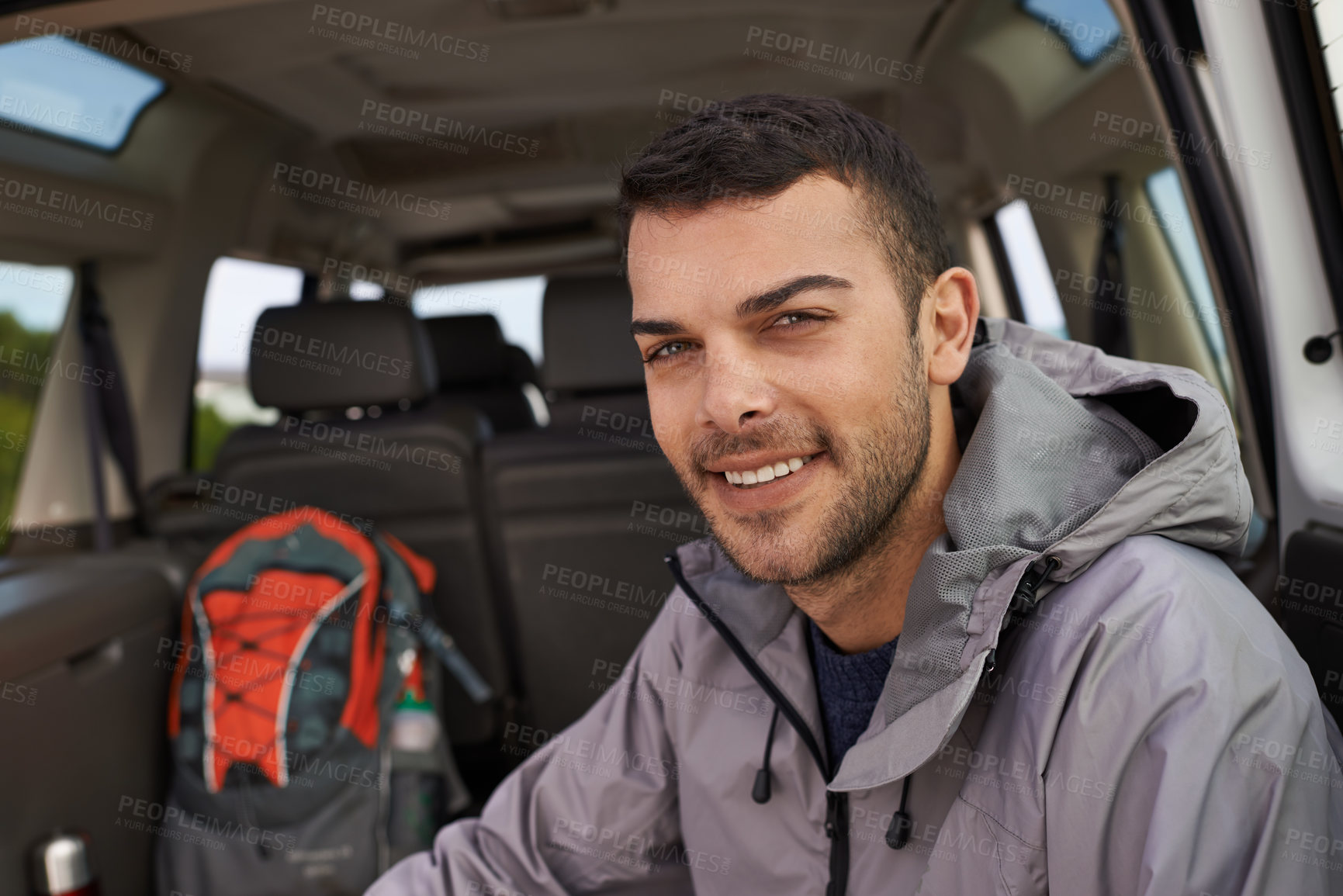 Buy stock photo Portrait, man or car in hiking on adventure, holiday or road trip for travel, leisure or recreation. Male person, hiker or relax or backpack for getaway, exploration and sightseeing in Canada