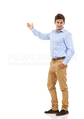 Buy stock photo Portrait, smile and man isolated, presenting space for product placement for marketing or advertising presentation. Mockup, gesture and model with deal announcement in studio on white background