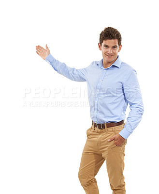 Buy stock photo Presenting, mockup and smile with portrait of man for direction, product placement or recommendation. Happy, natural and gesture with guy isolated on white background studio for empty, space or blank