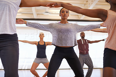 Buy stock photo Dancer, group and stretching at training in studio for workout, exercise or health for wellness. People, friends and together in dancing team for warm up, creative or balance in class, art or ballet