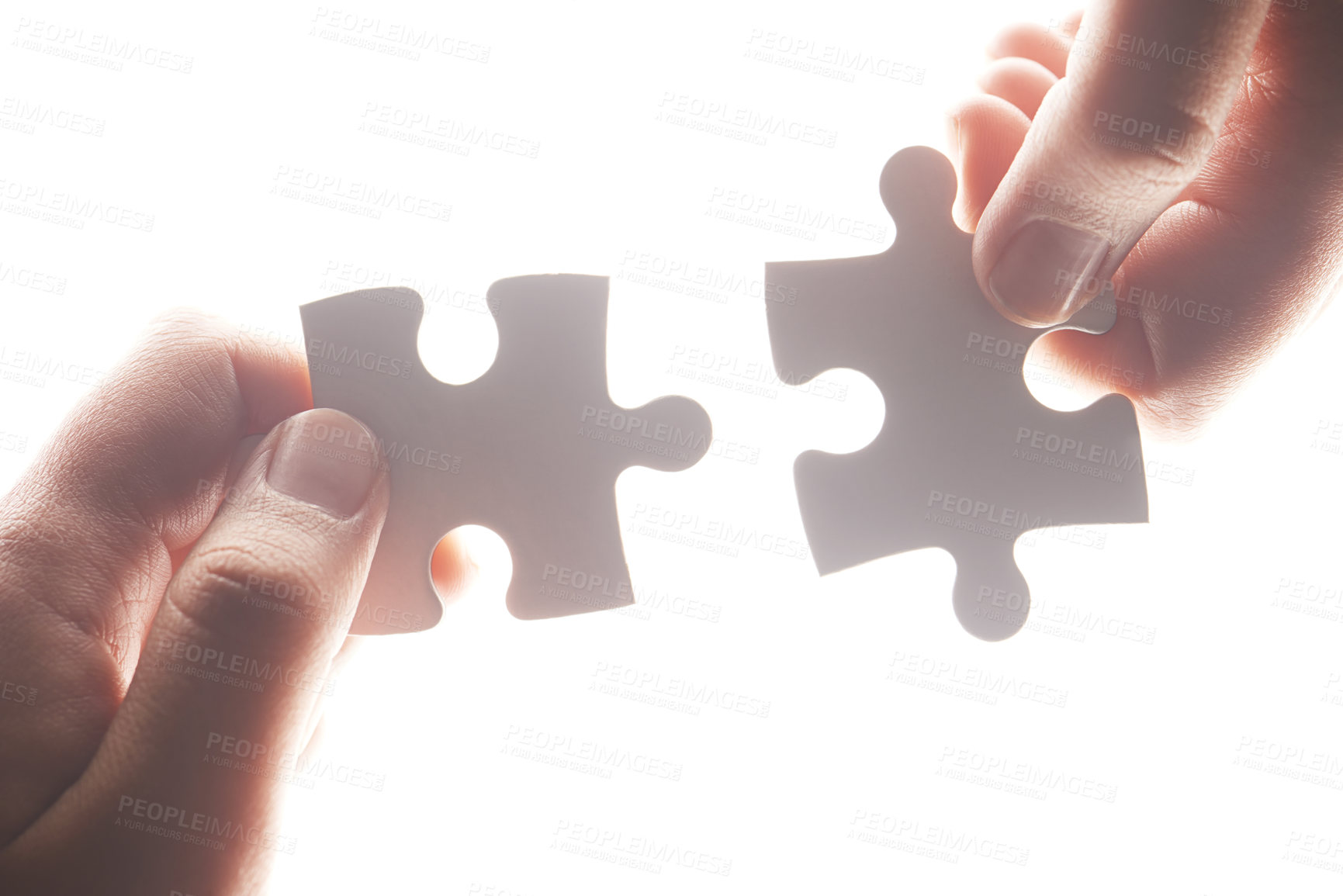 Buy stock photo Puzzle, synergy and solution with hands of person on white background for achievement, goal and development. Mission, game and cooperation with jigsaw pieces for support, success and integration