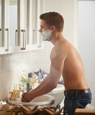 Buy stock photo Man, foam for shaving and grooming in bathroom, skincare and beauty with morning routine at sink. Skin health, cosmetic cream or soap for hygiene, dermatology and hair removal with facial at home