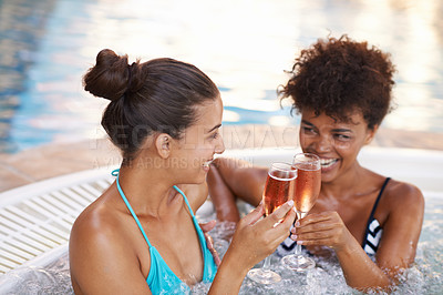 Buy stock photo Women, friends and Champagne in jacuzzi to relax, self care and pamper day at spa for wellness and cold beverage. Water, bubbles and alcohol drink in hot tub for detox and friendship date for bonding