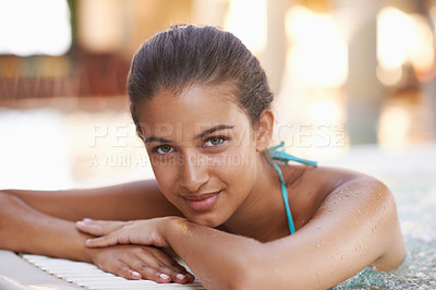 Buy stock photo Woman, portrait and relax in jacuzzi at resort for luxury vacation, summer holiday and spa on weekend. Tourist, girl and face with happiness in pool for swimming, fun getaway and wellness in bikini